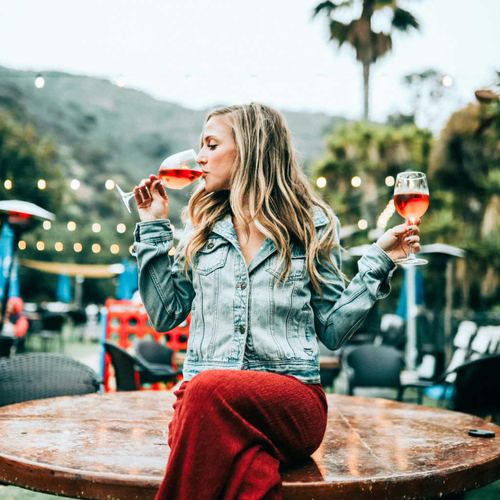 woman with wine glasses