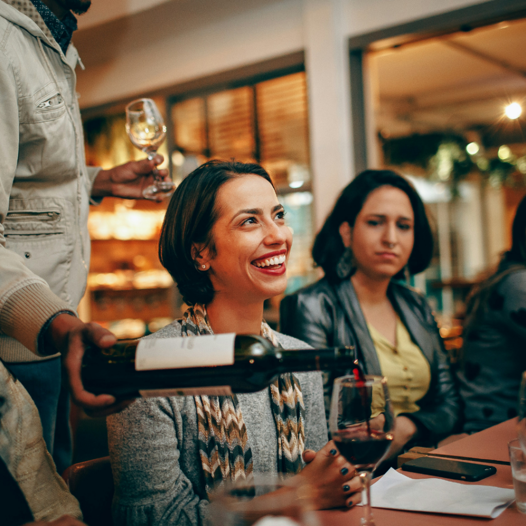 people drinking wine